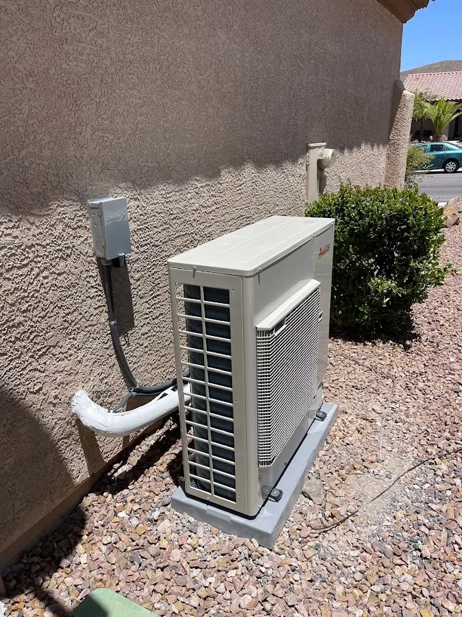 Residential air conditioning condenser unit in Selma
